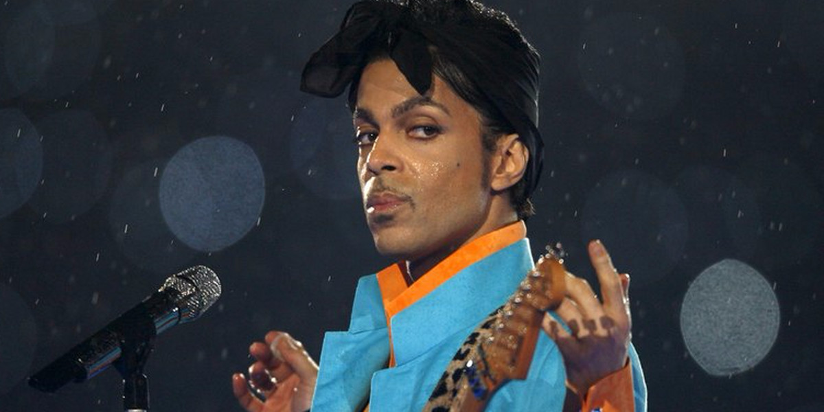 Prince performs during the halftime show of the NFL's Super Bowl XLI football game in Miami