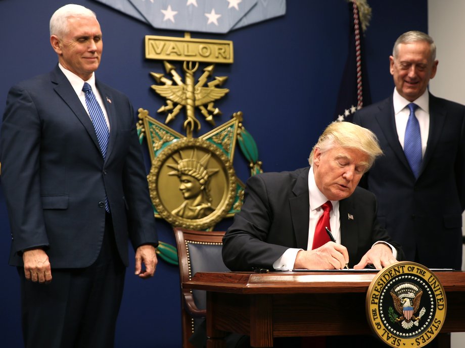 President Trump signs an executive order on January 27, 2017.