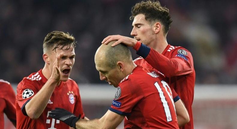 Dutch winger Arjen Robben (C), who turns 35 next month and has said he will retire at the end of the season, is congratulated by his Bayern Munich team-mates after scoring twice in the 5-1 trashing of Benfica a fortnight ago.