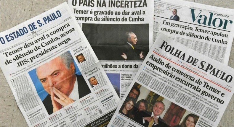 A view of the front pages of the main Brazilian newspapers, reporting on a scandal implicating Brazilian President Michel Temer and Senator Aecio Neves, in Sao Paulo, Brazil on May 18, 2017