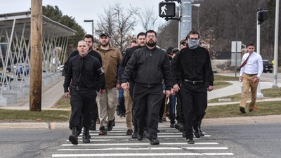 Members of the alt-right including Matthew Heimback from the Traditionalist Workers Party arrive onto the campus of Michigan State University for a Richard Spencer speech in East Lansing, Michigan