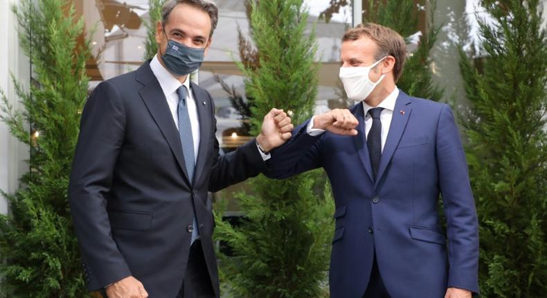 French President Emmanuel Macron, pictured with Mitsotakis, has supported Greece in the row with Turkey