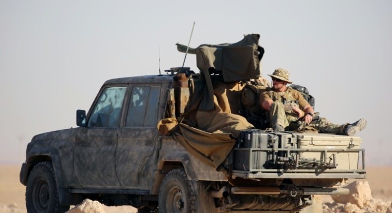 Western special forces, supporting the US-backed Kurdish-Arab forces, deploy on the frontline on November 6, 2016, as they launch an offensive on the Islamic State group's positions