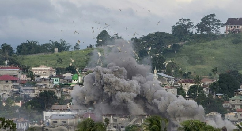 A bomb explodes after being dropped on an Islamist militants' hideout in Marawi, on the southern Philippine island of Mindanao