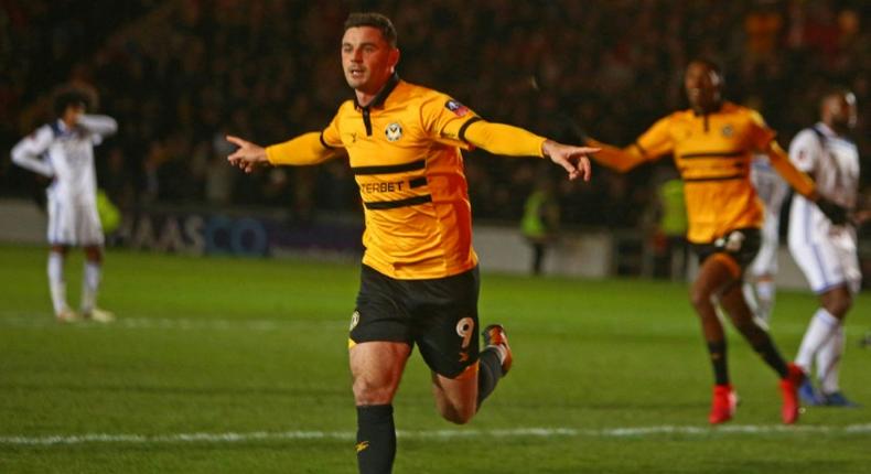 Padraig Amond celebrates after scoring the penalty that saw Newport County knock Premier League Leicester City out of the FA Cup with a 2-1 win in the third round at Rodney Parade on Sunday