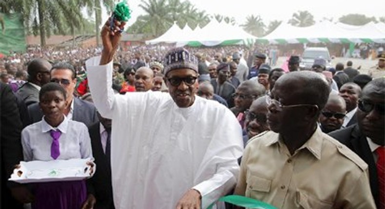 President Buhari with Governor of Edo State Adams Oshiomole as he Commissions Samuel Ogbemudia College as part of his visit to Edo State for the Commissioning of Infrastructural Projects in Benin City.