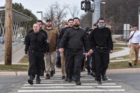 Members of the alt-right including Matthew Heimback from the Traditionalist Workers Party arrive ont