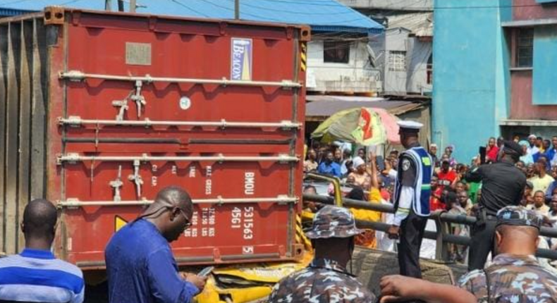 Container falls off truck in Lagos, crushes 9 passengers to death.