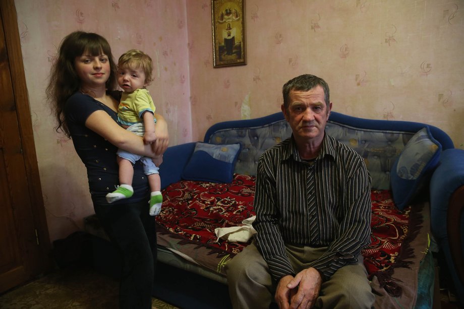 Alexander Malish, 59, pictured with his daughter Anya and her son Nikita