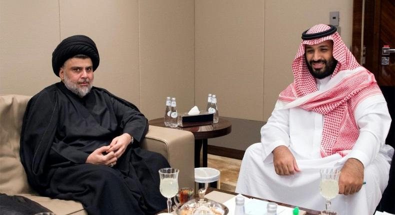 A handout picture provided by the Saudi Royal Palace on July 30, 2017 shows Crown Prince Mohammed bin Salman (R) receiving prominent Iraqi Shiite cleric Moqtada al-Sadr in Jeddah