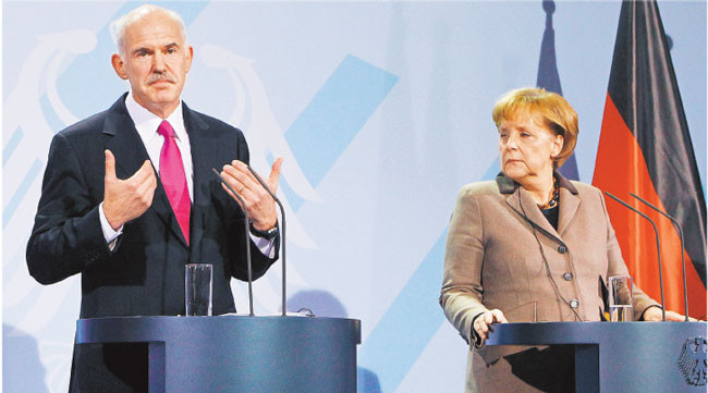 Premier Grecji Georgios Papandreu w czasie zeszłotygodniowej wizyty w Berlinie Fot. AP