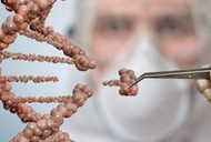 Scientist is replacing part of a DNA molecule. Genetic engineering and gene manipulation concept.