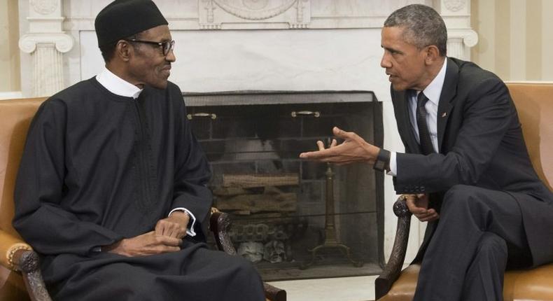 US President Barack Obama speaks with his Nigerian counterpart Muhammadu Buhari during a 2015 meeting at the White House