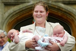 File picture shows the world's first test-tube baby Britain's Brown, facing the media as Professor Edwards looks on, in Cambridgeshire