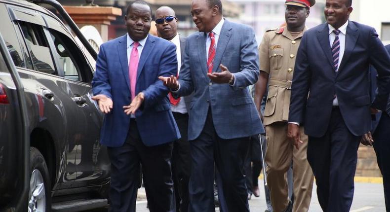 Interior cabinet secretary Fred Matiang'i, President Uhuru Kenyatta and Garissa Town MP Aden Duale 