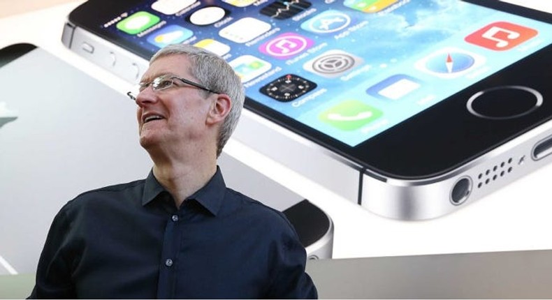 Tim Cook in front of an iPhone ad.Justin Sullivan, Getty Images