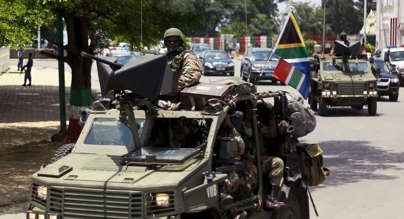 Military vehicles lead the way as South African President Jacob Zuma arrives as the head of an Africa Union-lead delegation in an attempt to broker dialogue to end months of violence in Burundi's capital Bujumbura February 25, 2016. REUTERS/Evrard Ngendakumana