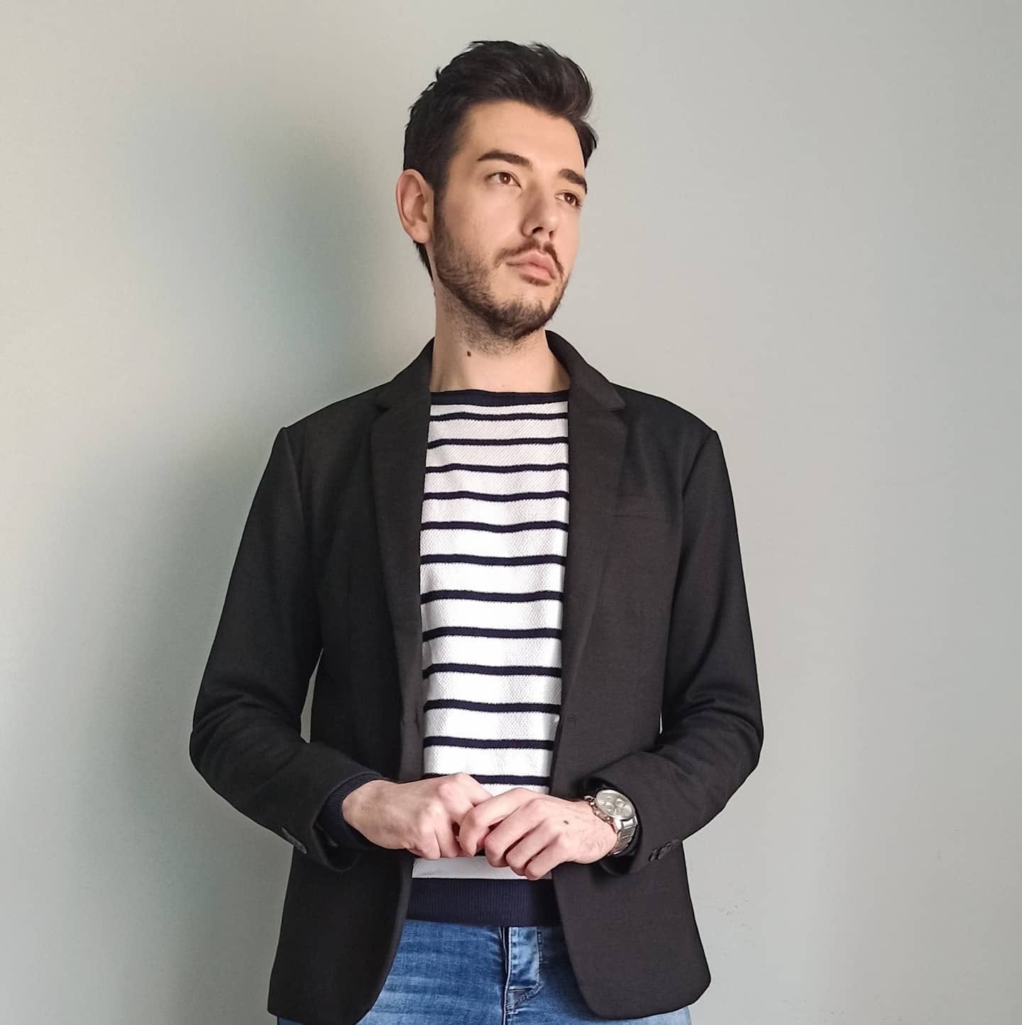 Srbský moderátor Marko Dejanović. 