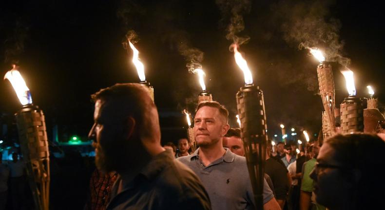 White nationalists participate in a torch-lit march on the grounds of the University of Virginia ahead of the Unite the Right Rally in Charlottesville, Virginia, in 2017.