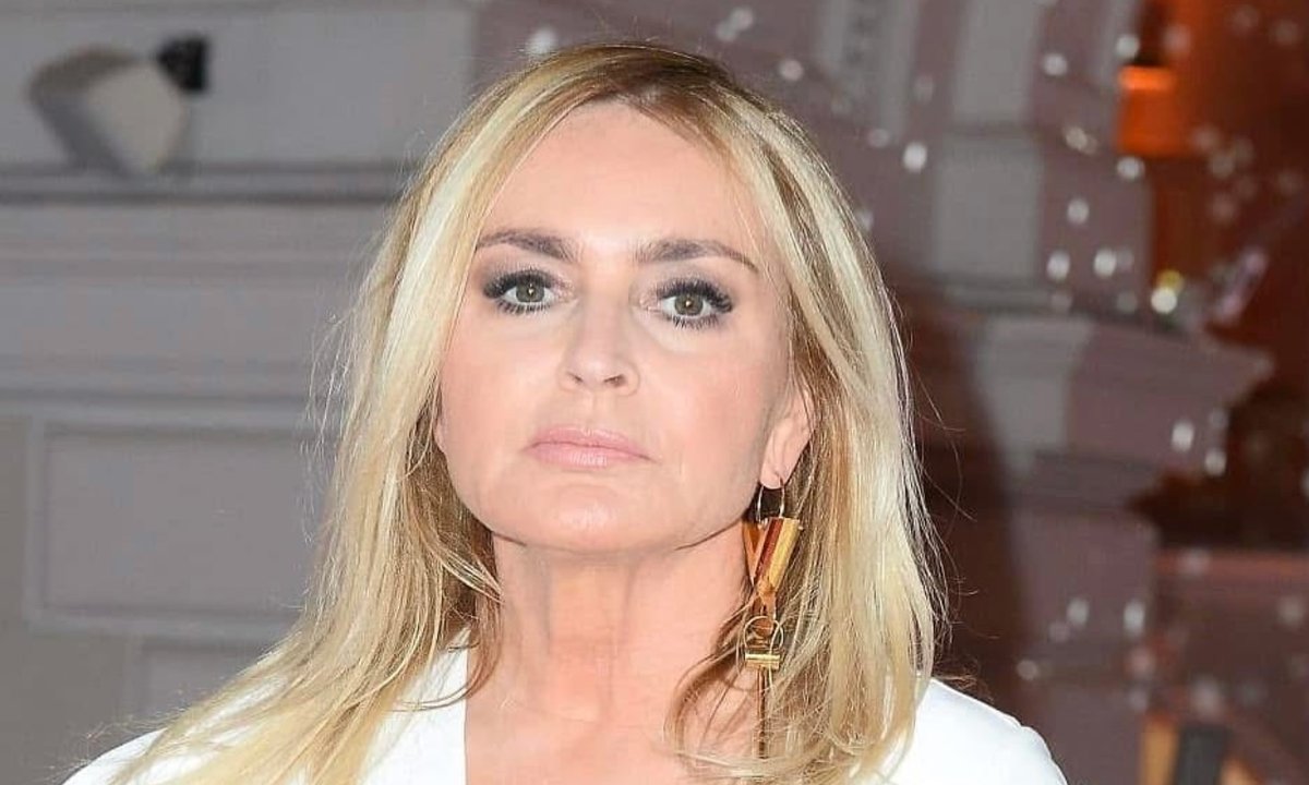 Monika Olejnik w mini i "towering boots". Te buty rewelacyjnie wydłużają nogi