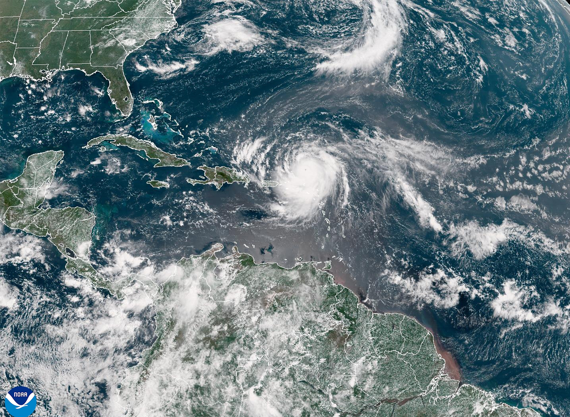 Hurricane Erin explodes to Category 5 as Caribbean braces