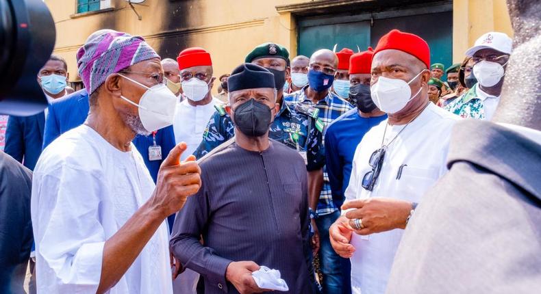 L-R: Minister of Interior Ogbeni Rauf Aregbesola, Vice President Yemi Osinbajo and Imo State Governor Hope Uzodinma visit the police facility attacked by gunmen on Monday, April 5, 2021 (Interior Ministry)