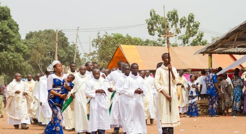 Priests of the Very Holy Church of Jesus Christ of Baname arrive at the Nazareth church in Djidja