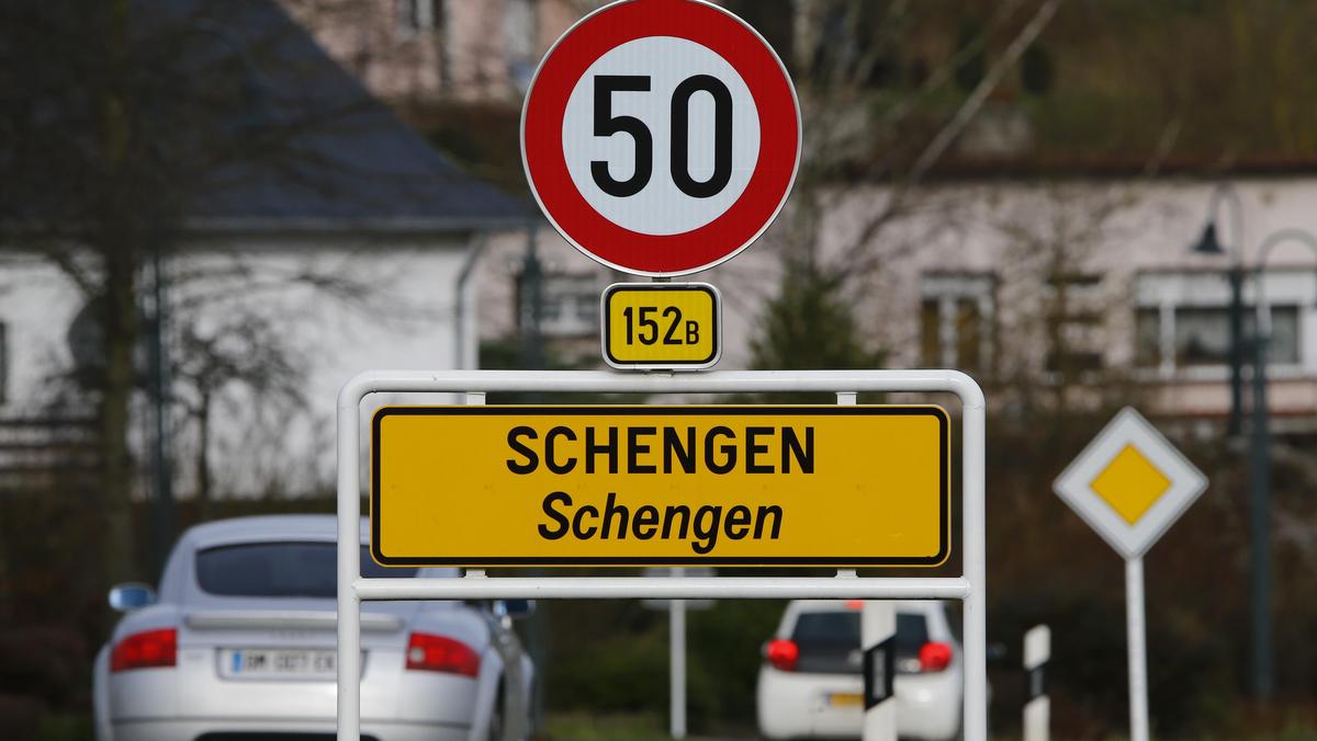 A street sign marks the beginning of the small Luxembourg village of Schengen