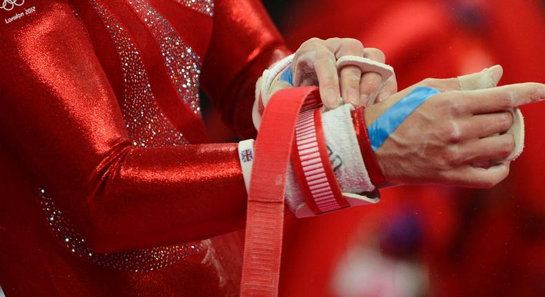 Britain's Beth Tweddle prepares her hands during the women's gymnastics qualification at the North Greenwich Arena during the London 2012 Olympic Games (file photo).