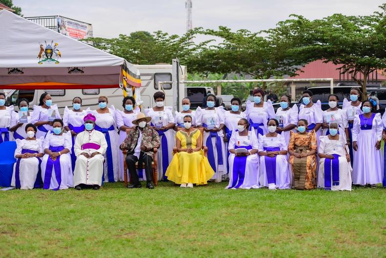 President Museveni and First Lady Janet posed with Mothers Union women at the conference