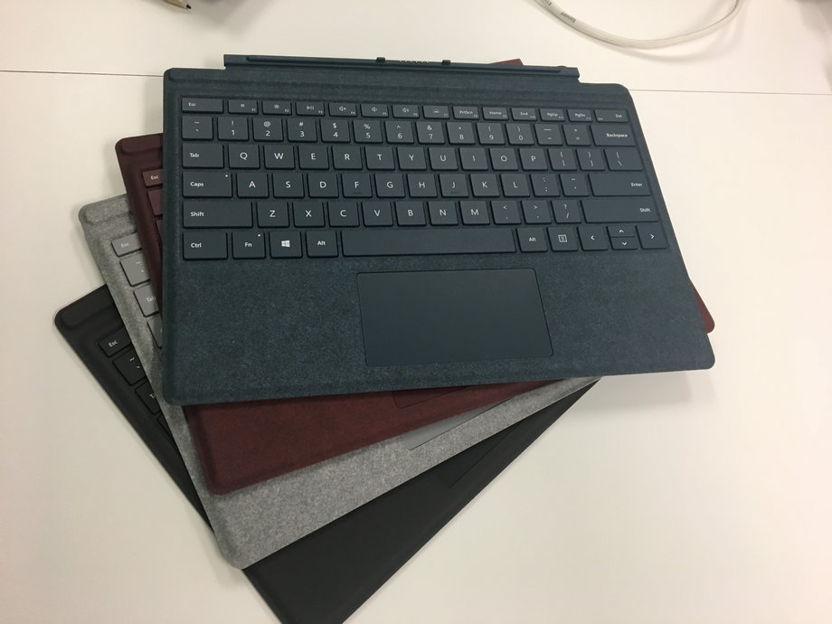 The new colors of Surface Pro Signature Type Cover. These high-end models are covered in alcantara fabric and go for $159 a pop — but they turn the Surface Pro into a proper laptop.