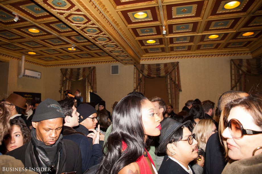 Socialites filed into the packed lobby to grab a drink before start time.