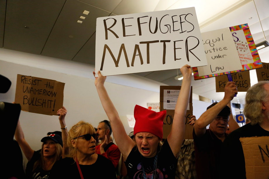 Demonstrators yell slogans during protest against the travel ban imposed by U.S. President Donald Trump's executive order, at Los Angeles International Airport in Los Angeles, California, U.S., January 29, 2017.