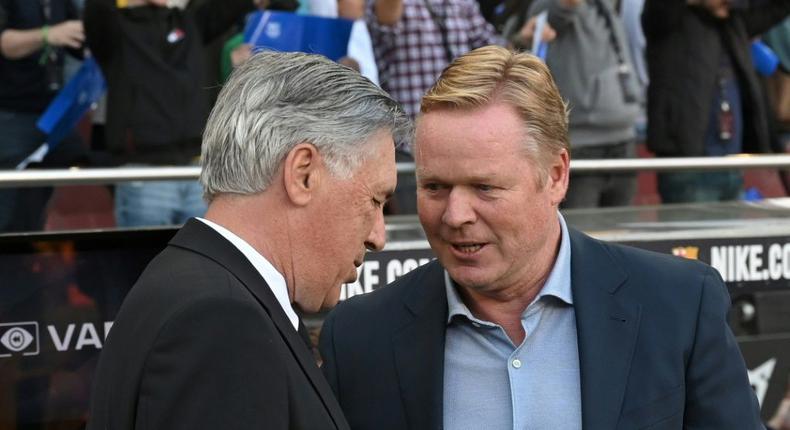 Ronald Koeman (right) greets Real Madrid coach Carlo Ancelotti before the Clasico on Sunday Creator: LLUIS GENE