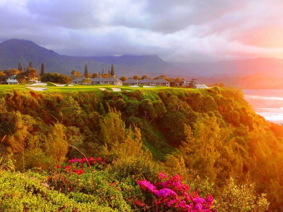 The Princeville Makai Golf Course in Princeville, Hawaii, was designed by Robert Trent Jones, Jr. and includes stunning views over Hanalei Bay at its signature 7th hole. The course is also one of the first to offer players GolfBoards — vehicles that are designed to make players feel as though they are surfing through the terrain.