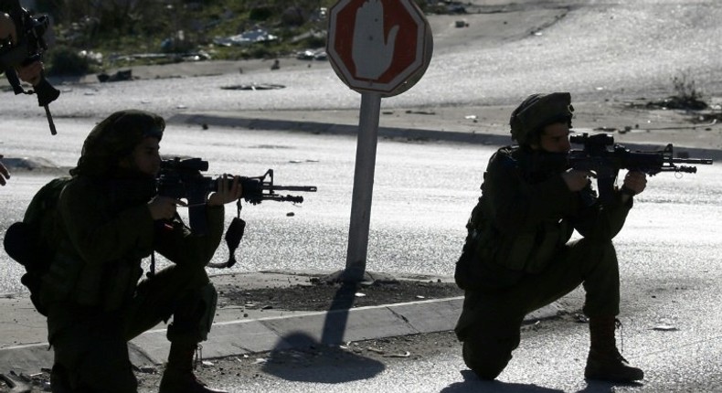 Israeli soldiers and Palestinian stone throwers clash east of Nablus, in the occupied West Bank