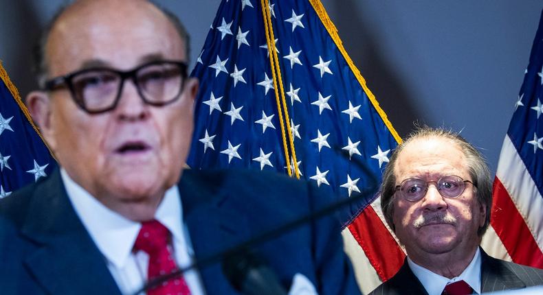 Rudolph Giuliani, left, and Joseph diGenova, center, attorneys for President Donald Trump, conduct a news conference at the Republican National Committee on lawsuits regarding the outcome of the 2020 presidential election on Thursday, November 19, 2020