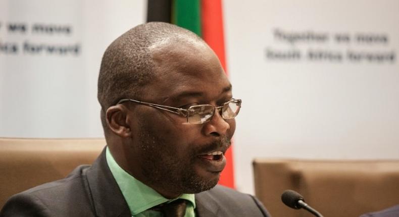 South African Justice Minister Michael Masutha gives a press briefing in Pretoria on October 21, 2016 regarding South Africa's decision to withdraw from the International Criminal Court