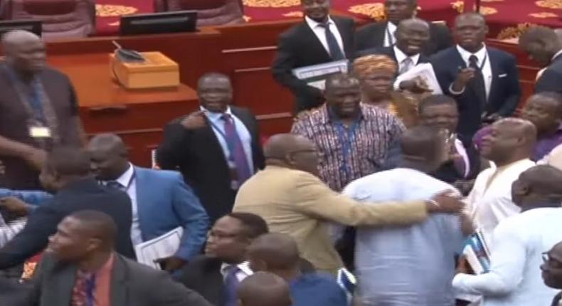 Mayhem as Ghana’s Members of Parliament nearly fight over bribery allegation report