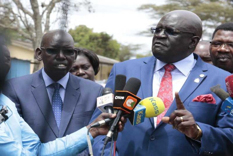 Education Cabinet Secretary George Magoha with PS Belio Kipsang