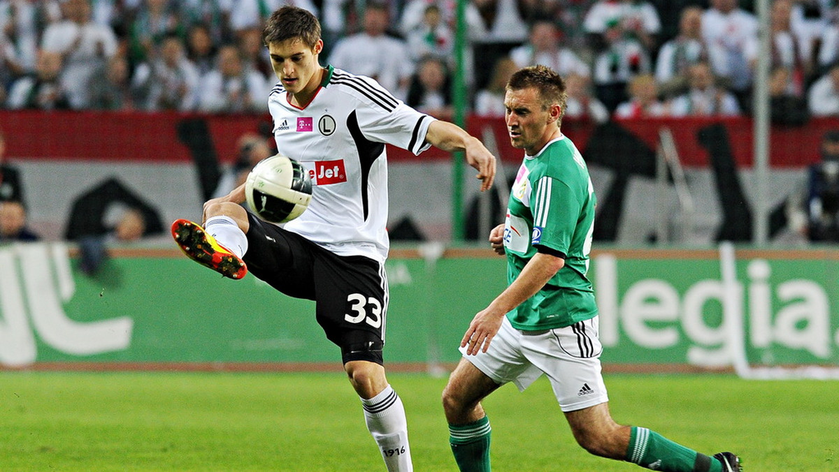 Legia Warszawa zremisowała z GKS Bełchatów 1:1 (1:0) w ostatnim sobotnim meczu 23. kolejki piłkarskiej T-Mobile Ekstraklasy.