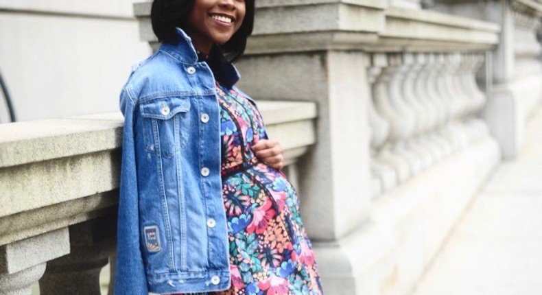 Nifesimi throws on a distressed denim over floral skater dress