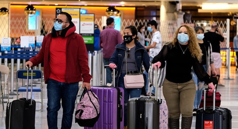 Travelers at LAX airport in December 2020