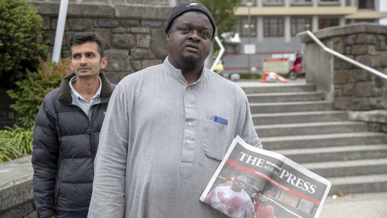 Lateef Alabi at the entrance to Christchurch hospital after attending a police briefing detailing the return of bodies to grieving families of the mosque shooting victims [Stuff] 