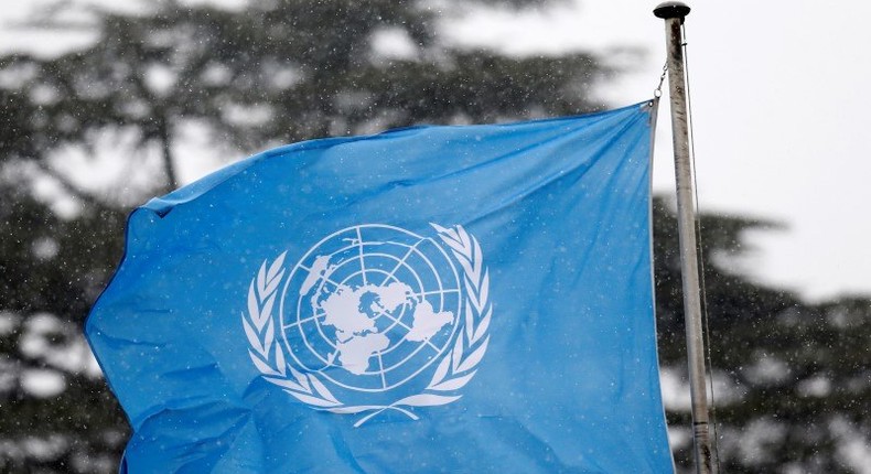 A United Nations flag flies outside the the European headquarters of the United Nations ahead of new round of meetings for the Syria talks in Geneva, Switzerland, March 16, 2016. 