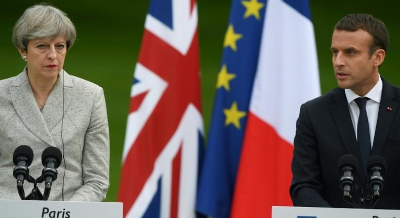 French President Emmanuel Macron said the door was 'always open' for Britain to remain in the EU despite Prime Minister Theresa May saying Brexit talks would begin next week