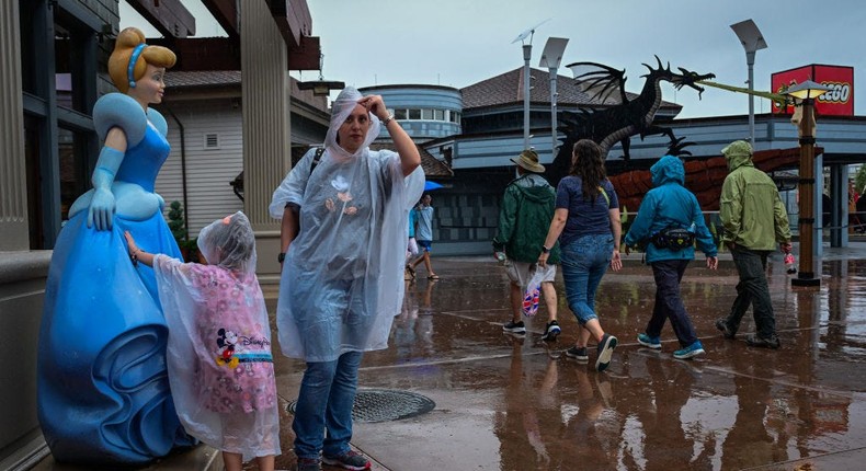 As Hurricane Milton neared, Disney had to balance safety for guests and staff — and the company's bottom line.Giorgio Viera/AFP via Getty Images