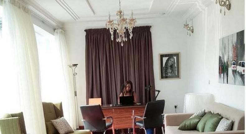 Linda Ikeji working in her office mansion 