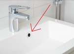 Why is there a hole at the top in every bathtub and sink?