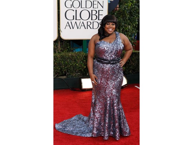 Gabourey Sidibe. Może nie imponuje smakiem, ale jest mistrzynią w minimalizowaniu strojem defektów swojej ogromnej sylwetki